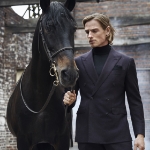 Suited man with a horse